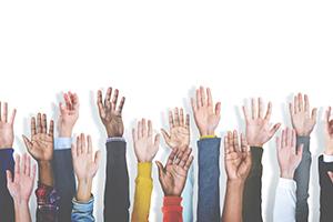 Diverse hands in the air