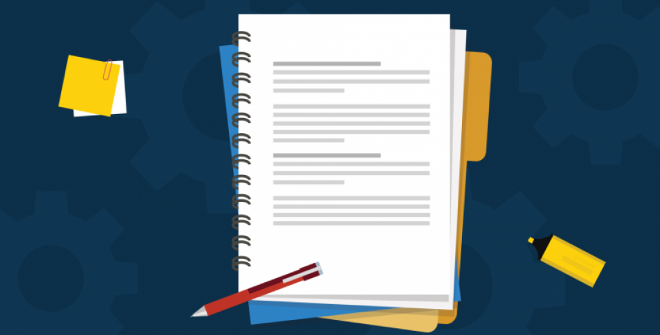 A guidebook with a pencil, highlighter and post-it notes